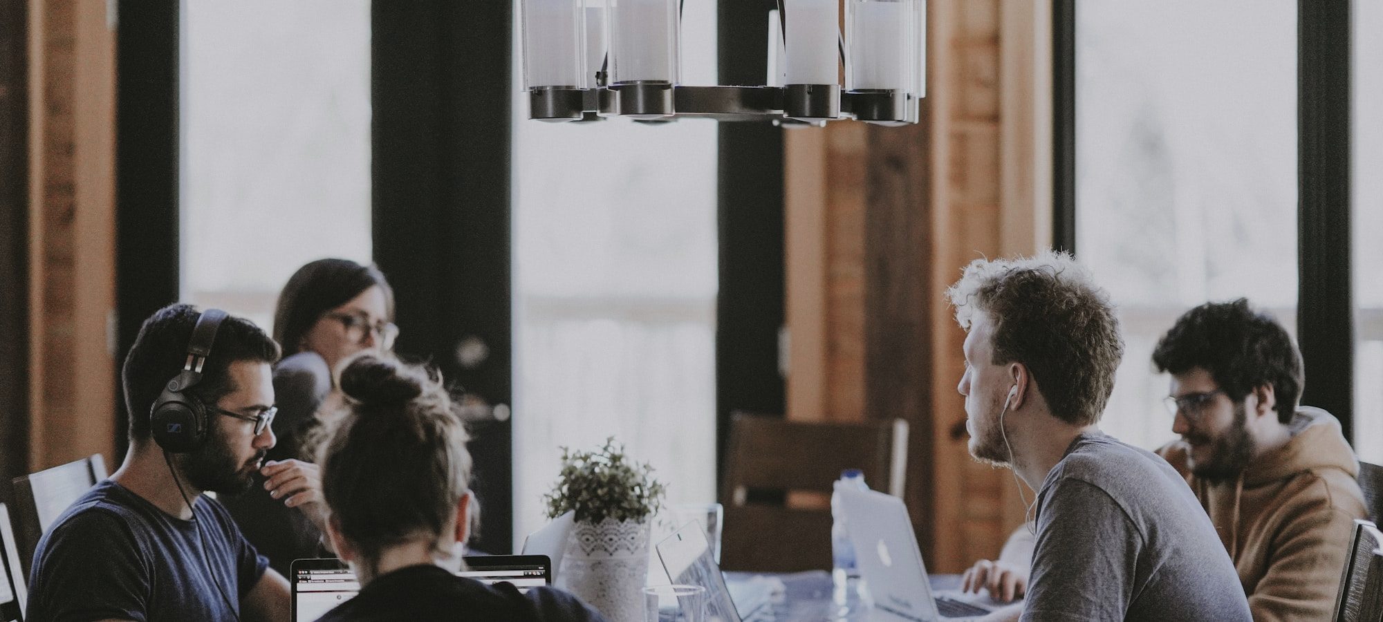 Founders in discussion around a table