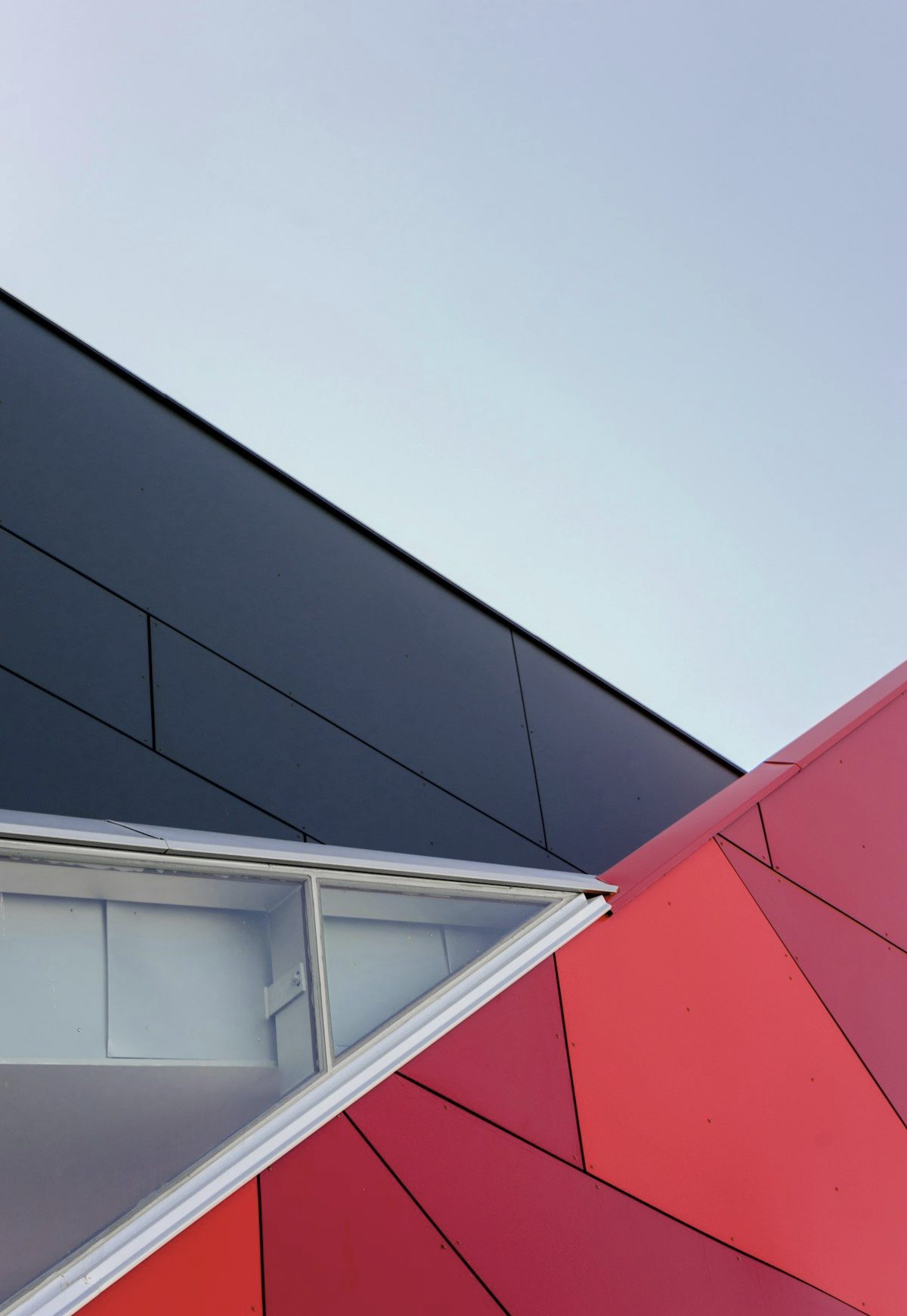 Concrete facade with a red awning